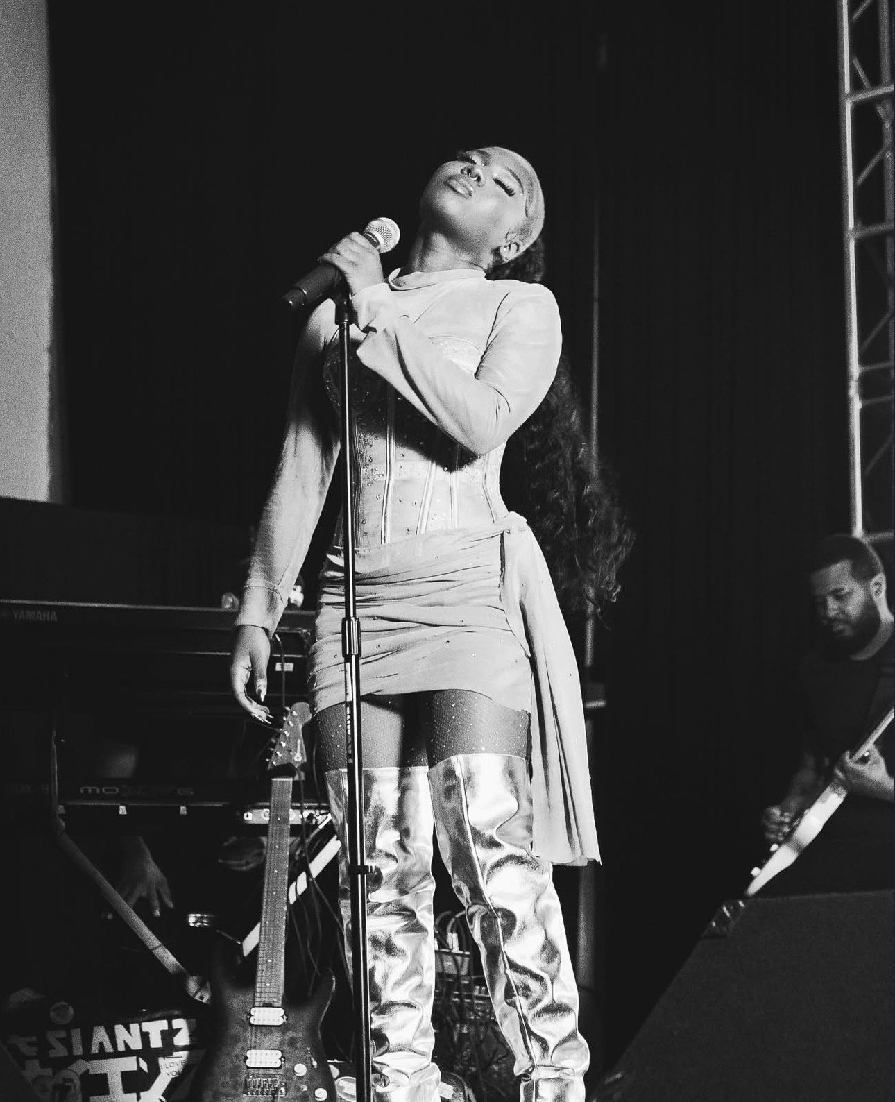 Amadi performing on stage